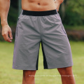 New Bodybuilding Workout Shorts Cantura elástica masculina Sports Sportswear com shorts esportivos de bolso com zíper para homens